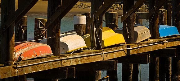 Colored boats on dock